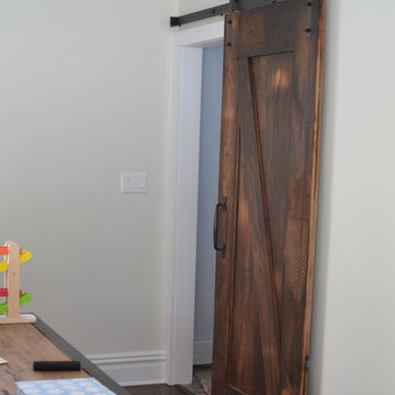 Barn door sliding on forged iron hardware