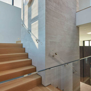 Horizontal lime plaster application on elevator walls