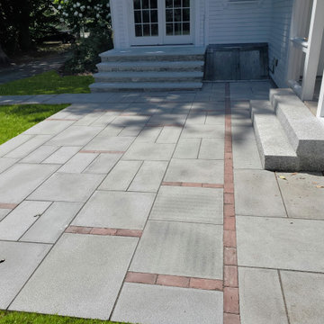 Granite and brick patio, entrance steps and walkway