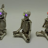 Bone Stretchers Yoga Skeleton Figurines with Color Changing LED Eyes Set of 3