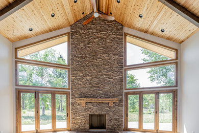 Example of a mountain style living room design in Other