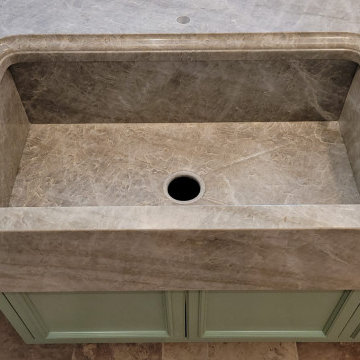 Victoria Falls & Ice Flakes countertops with stone farm sink