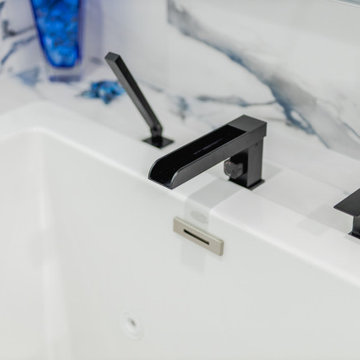 Bathroom remodeling in Columbia, MD with double vanity & marble bathtub