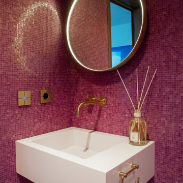 Basalte controls seamlessly blend with the design of this bathroom