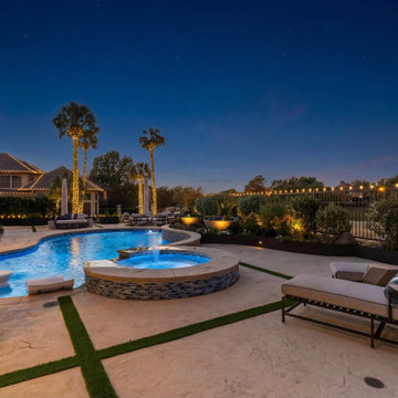 Custom Outdoor Living Pool Deck with Stamped Concrete & Turf
