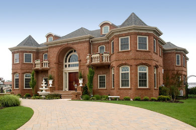 Inspiration for a mediterranean brick exterior home remodel in Philadelphia