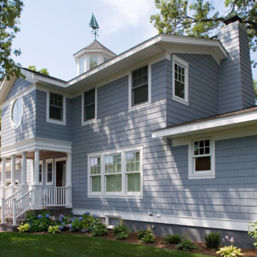 Beautiful Traditional Blue Wooden Siding Suburban Home - White Windows & Frames