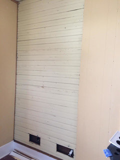 Original 1930s walls uncovered in kitchen-- bead board and 24 studs!