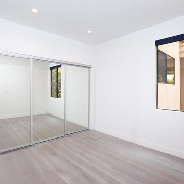Bedroom With Mirrored Sliding Closet Doors