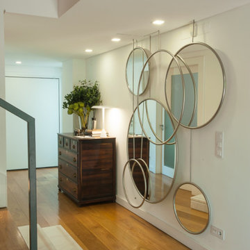 Entrance Hall with Round Mirrors and Table Lamp, Paço de Arcos