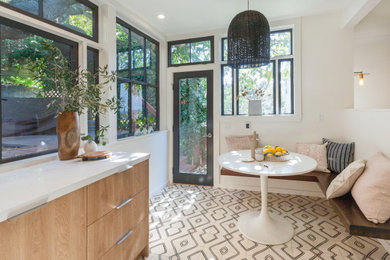 Breakfast nook - contemporary multicolored floor breakfast nook idea in San Francisco with beige walls
