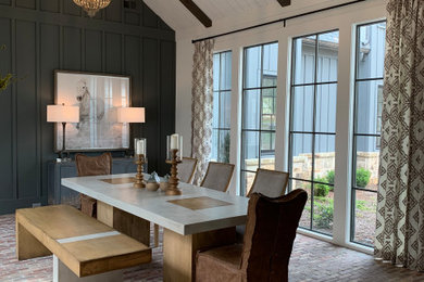 This is an example of a transitional dining room in Atlanta.