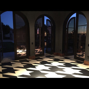 Design ideas for an expansive modern home studio in Los Angeles with lino flooring.