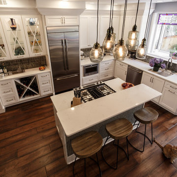 Transitional White Kitchen Remodel | Glass Display Cabinets & Custom Island