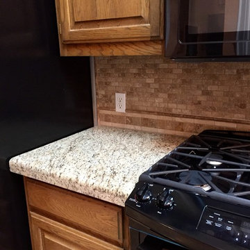 Bronco Bend - Angleton - Travertine Flooring/Granite Countertops