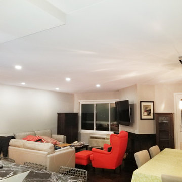 Covered Popcorn Ceilings and added Recessed Lighting in a Condo
