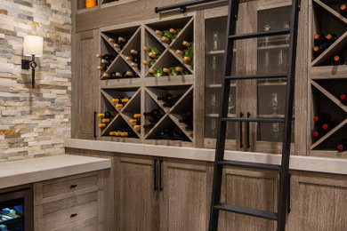 Wine cellar - rustic wine cellar idea in Denver