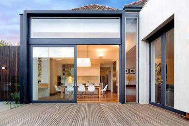 Example of a large beach style home design design in Orange County