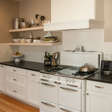 Kitchen with reclaimed wood floating shelves - Oregon