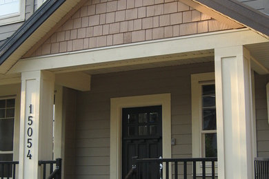 Arts and crafts home design photo in Vancouver
