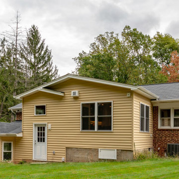 Cheerful Multi Level Rear Addition to Expand Kitchen, Mudroom & Sunroom in Oakt