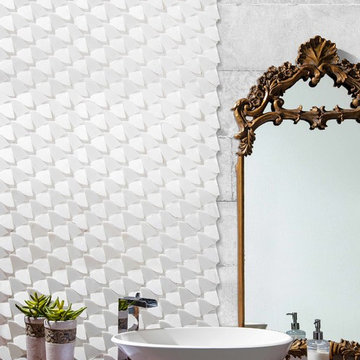 Modern white bathroom with unique mosaic wall