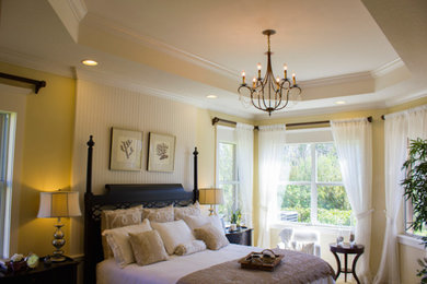 Bedroom - bedroom idea in Tampa with yellow walls