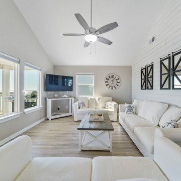 Coastal Home featuring "Castaway Oak" CALI Vinyl flooring.