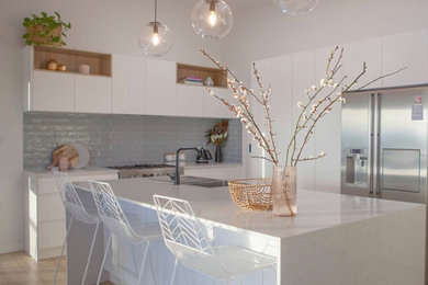 This is an example of a beach style kitchen in Hobart.