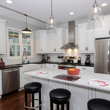 First Floor Addition and Renovation, Kitchen Renovation, and New Flooring