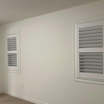 California Shutters with Blackout Roller Shades in back