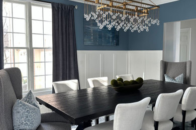Transitional wainscoting kitchen/dining room combo photo in Chicago with multicolored walls