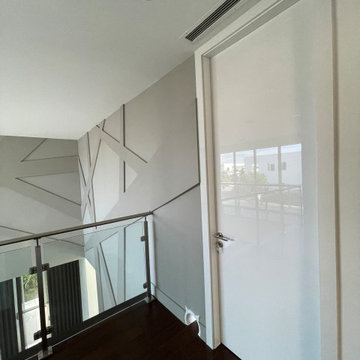 Architectural Millwork + Wall Paneling with Hidden Door + Bar area