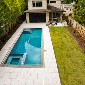 Modern Rectangular Pool with Spa & Clean Hardscape Design