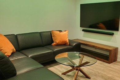 Family room - contemporary family room idea in Montreal