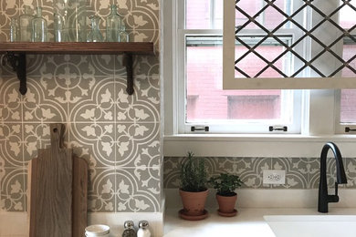 Inspiration for a small craftsman galley terra-cotta tile kitchen remodel in Baltimore with an undermount sink, shaker cabinets, white cabinets, granite countertops, cement tile backsplash, stainless steel appliances and a peninsula