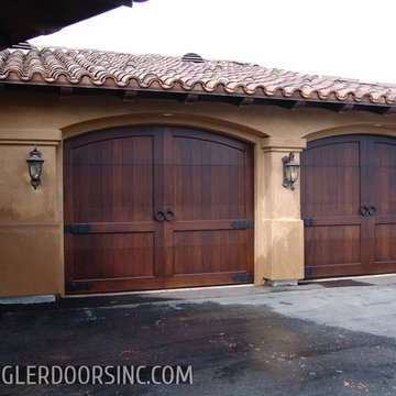 Custom Made Arched top carriage style wooden garage doors