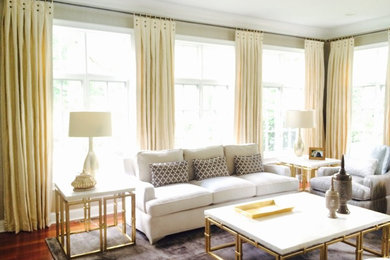 Living room - modern open concept medium tone wood floor living room idea in Philadelphia with gray walls