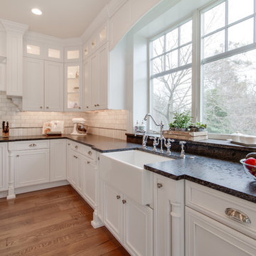Mont Blanc Quartzite & Silver Pearl Granite in a White Kitchen