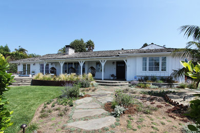 Inspiration for a large transitional white one-story house exterior remodel in Los Angeles