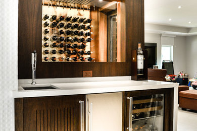 Mid-sized contemporary wine cellar in Miami with porcelain floors, display racks and multi-coloured floor.