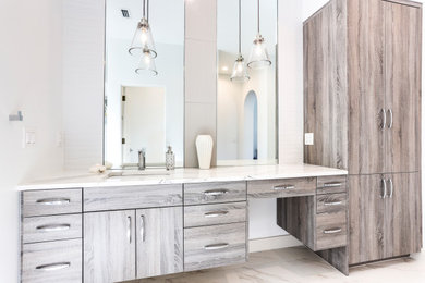 Inspiration for a large modern bathroom in Other with flat-panel cabinets, a freestanding tub, a curbless shower, white tile, porcelain tile, an undermount sink, engineered quartz benchtops, an open shower, a single vanity and a built-in vanity.