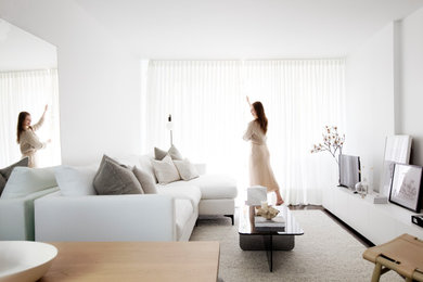 Example of a minimalist living room design in Vancouver