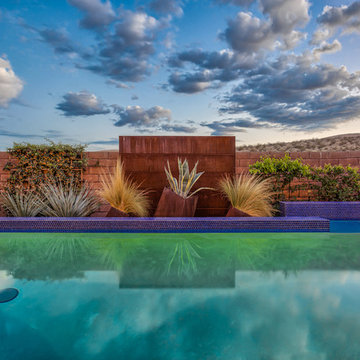 Raised Rim Flow Pool with Custom Fire/Water Feature