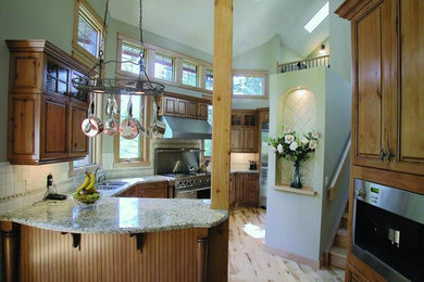 Example of an arts and crafts kitchen design in Calgary