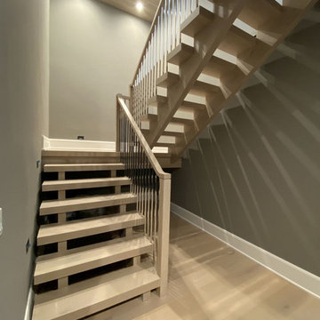 White Oak Stairs with Polished Stainless Steel Balusters
