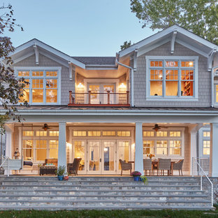 Inspiration for a large coastal two-story wood exterior home remodel in Baltimore