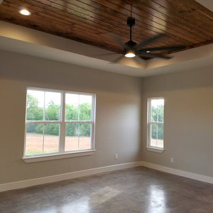 Schlafzimmer mit Betonboden und Holzdecke Ideen, Design & Bilder