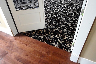 Inspiration for a large mediterranean open concept medium tone wood floor and brown floor family room remodel in Vancouver with a music area, beige walls and a media wall