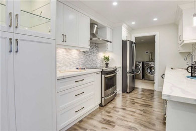 Transitional kitchen photo in Toronto